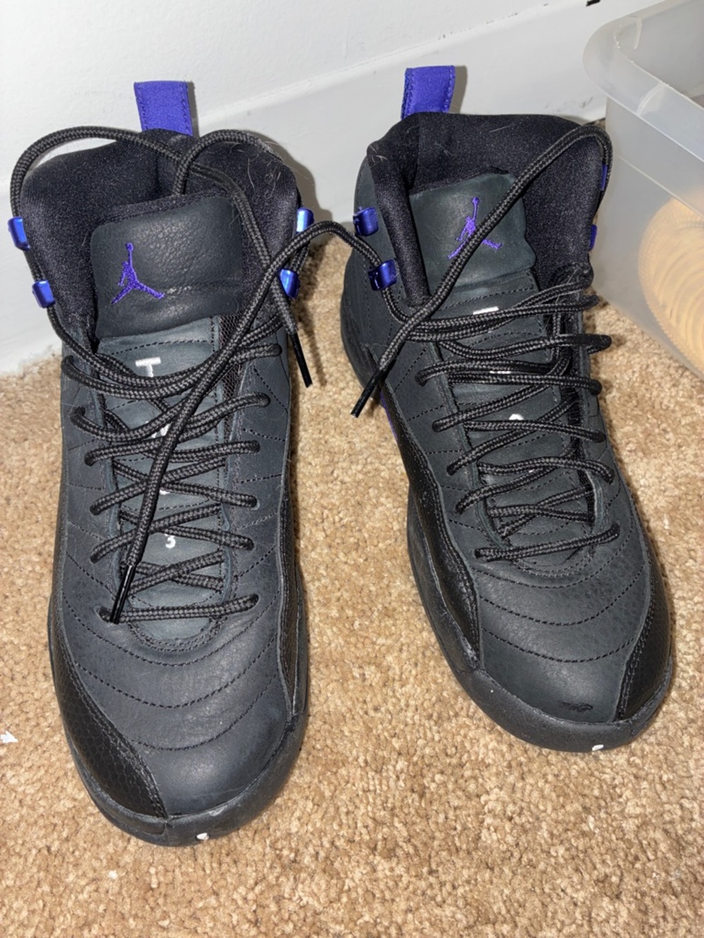 Jordan Men’s Black Athletic Shoes with Purple Accents